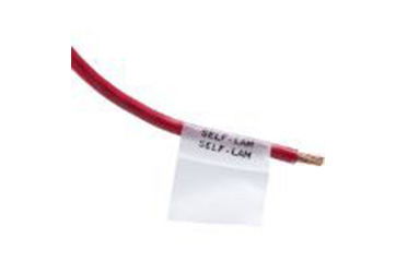 A self-laminating wire label.